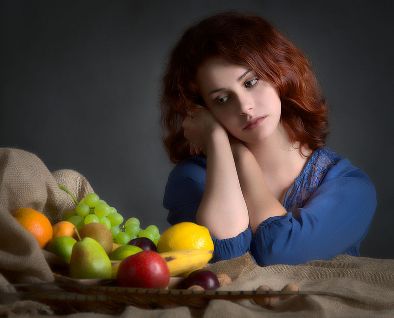 Woman and fruits